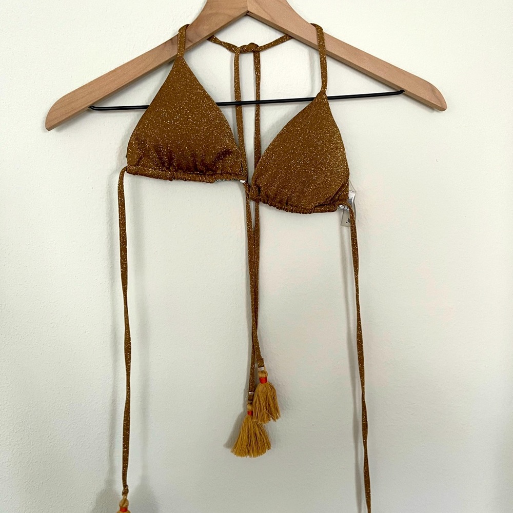Super fun Maaji bikini top that offers modern glam and reversible style!